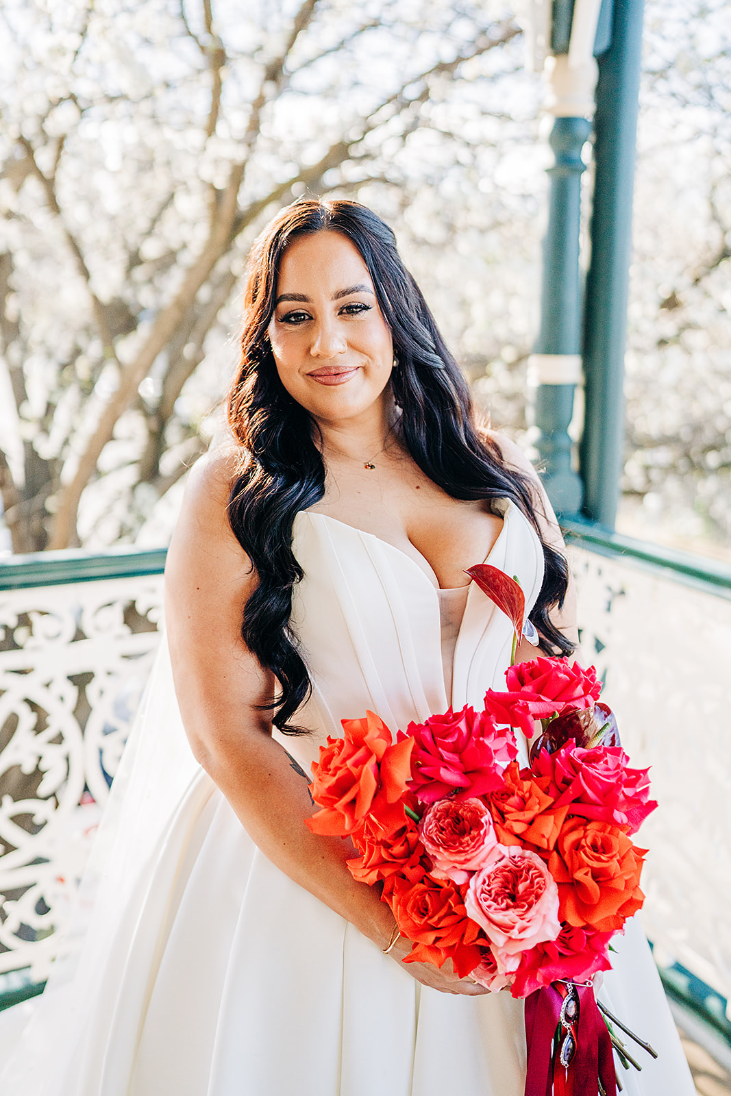 portrait of bride holding her bouquet at harvest home balcony