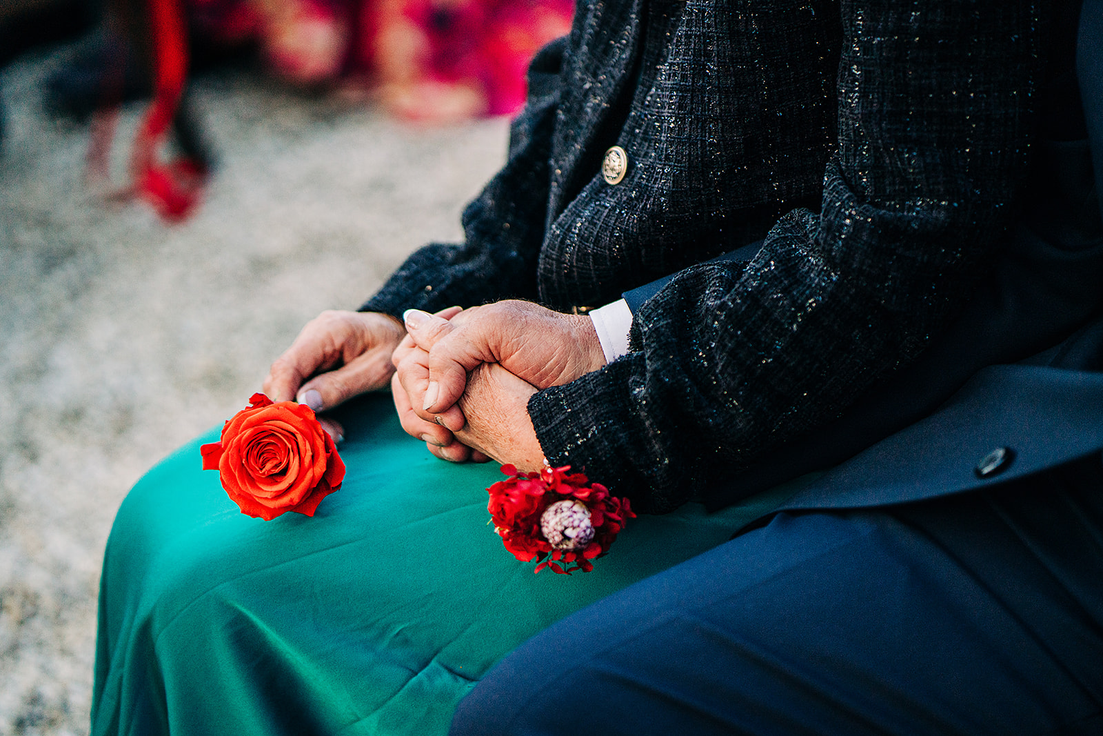 brides parents holding hands