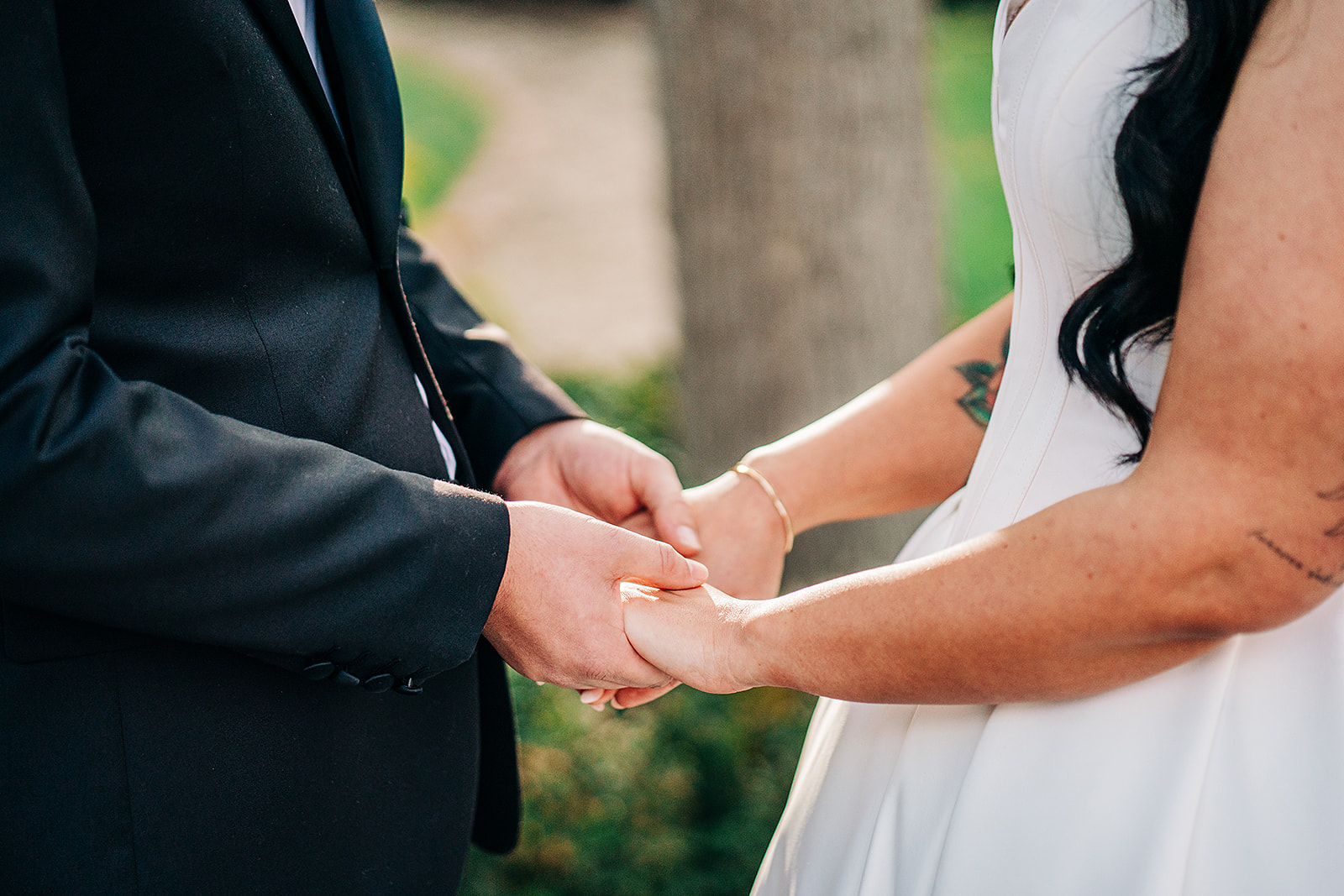 close up of couple holding hands