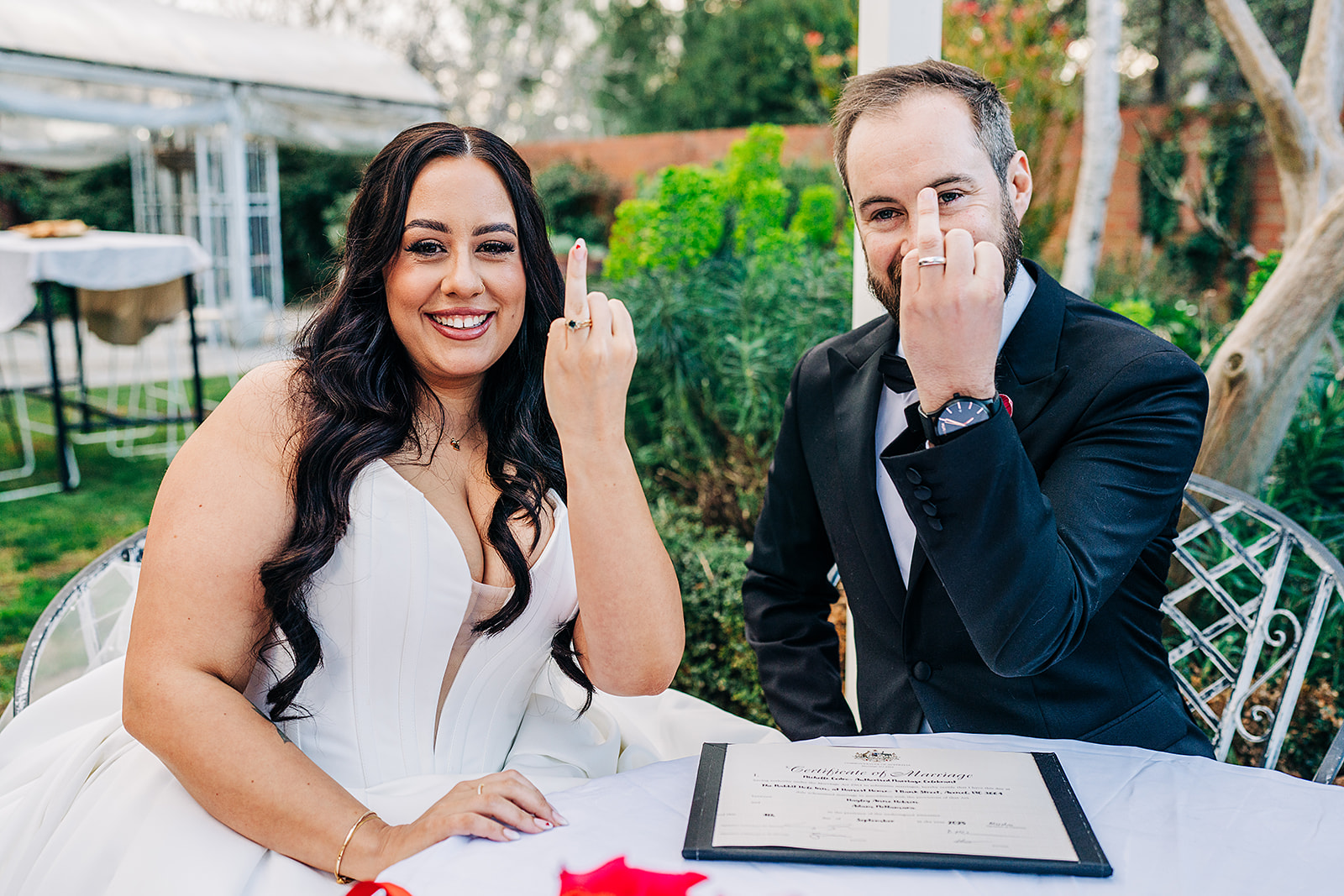couple with ring fingers up at harvest home