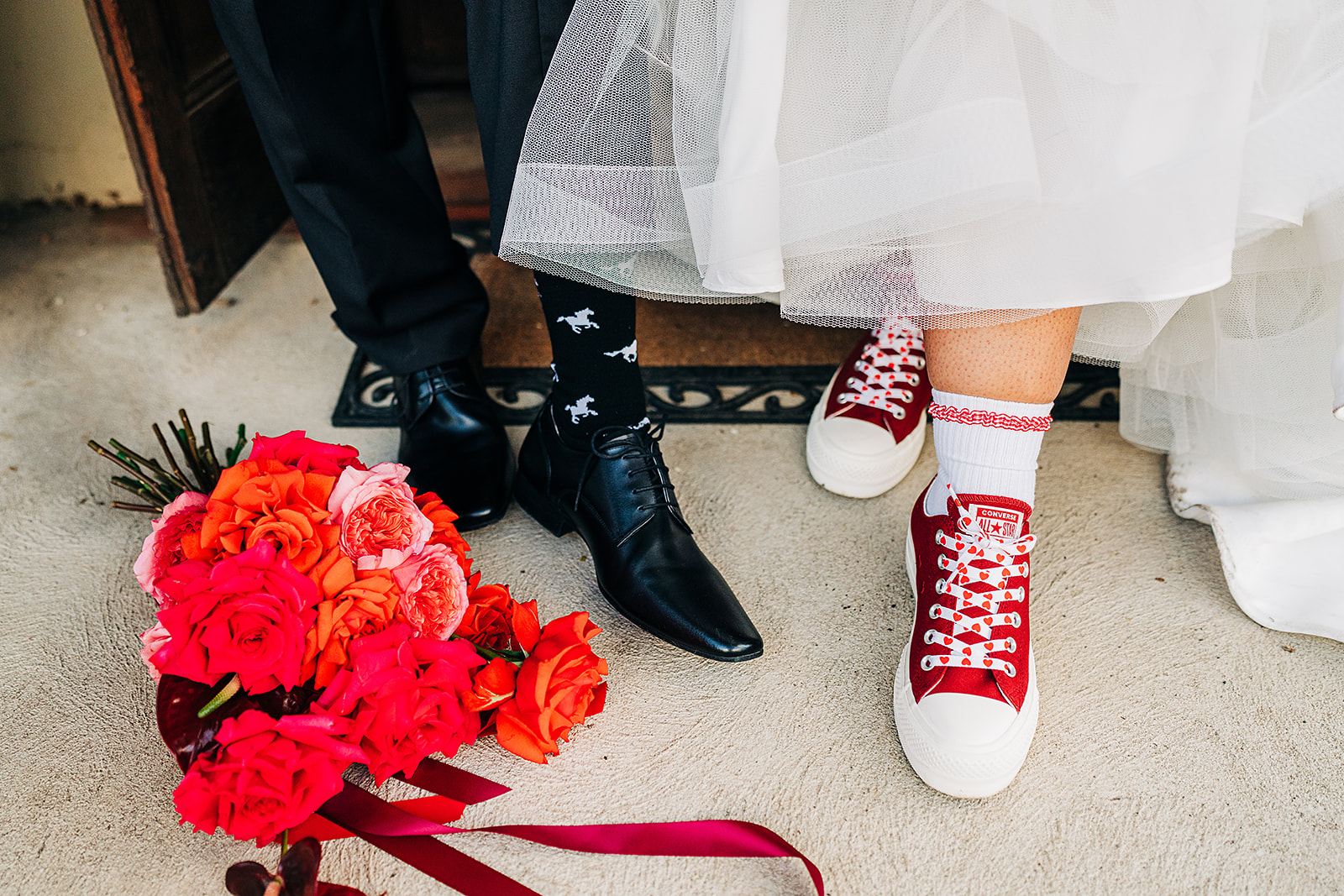 brides red converse shoes with love heart laces