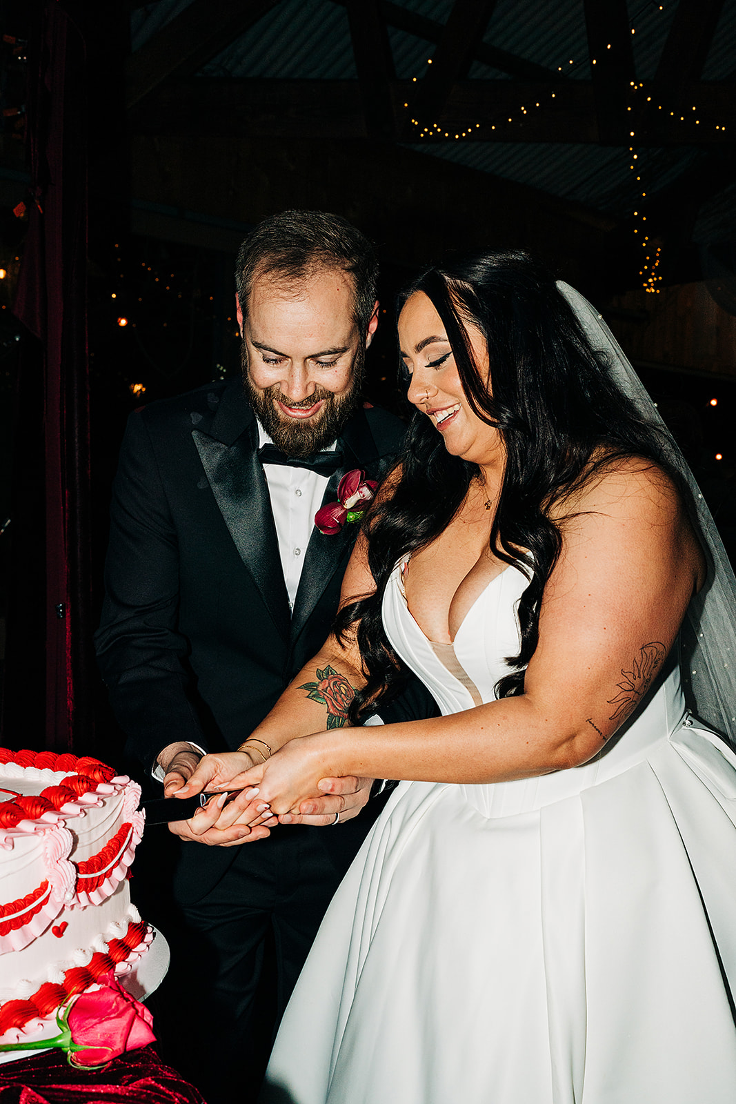 couple cutting wedding cake