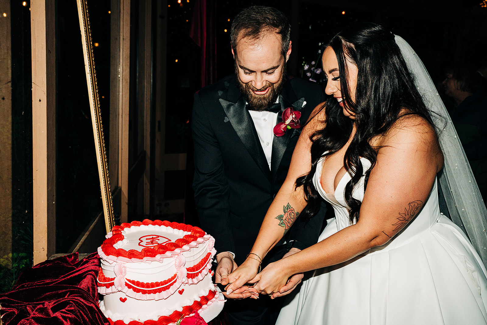 couple cutting wedding cake